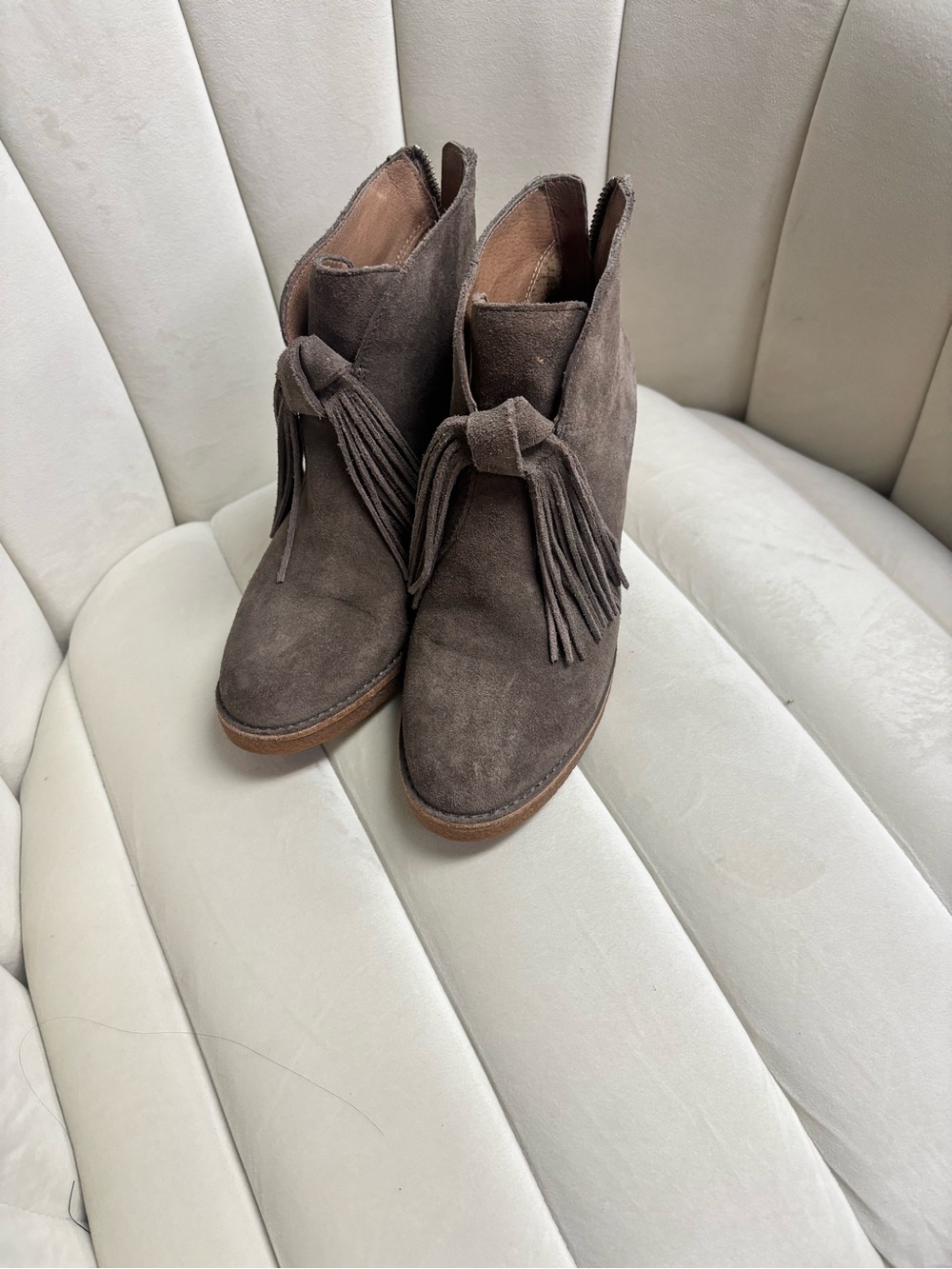 Ankle-height suede fringe booties